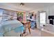 View of home office with neutral colors, natural light, and tile flooring at 2533 Limewood Dr, Holiday, FL 34690