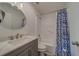 Well-lit bathroom featuring a shower and tub combo with a modern vanity at 2700 Bayshore Blvd # 588, Dunedin, FL 34698
