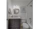 Updated bathroom featuring modern vanity with updated lighting and a shower-tub combo at 2700 Bayshore Blvd # 588, Dunedin, FL 34698
