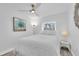 Serene bedroom with a ceiling fan, soft lighting, and a minimalist aesthetic at 2700 Bayshore Blvd # 588, Dunedin, FL 34698