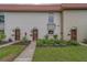 Charming townhome exteriors with well-kept lawns and inviting entrances at 2700 Bayshore Blvd # 588, Dunedin, FL 34698