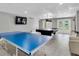 The community game room features a ping pong table, pool table, and tv for entertainment at 2700 Bayshore Blvd # 588, Dunedin, FL 34698