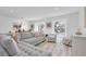 Spacious living room featuring new flooring, neutral color palette, and ample natural light at 2700 Bayshore Blvd # 588, Dunedin, FL 34698