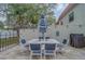 Outdoor dining area with seating for six, ideal for entertaining and enjoying meals at 2700 Bayshore Blvd # 588, Dunedin, FL 34698