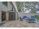 Charming patio area featuring comfortable seating and a convenient storage shed at 2700 Bayshore Blvd # 588, Dunedin, FL 34698