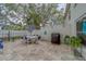 A backyard patio area with room for relaxing or grilling and room to entertain at 2700 Bayshore Blvd # 588, Dunedin, FL 34698