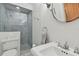 Modern bathroom with a glass-enclosed shower, sleek fixtures, and a vessel sink for a spa-like experience at 3006 W Angeles St, Tampa, FL 33629