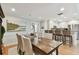 Traditional dining room boasting hardwood floors, an open concept kitchen and ample natural light at 3006 W Angeles St, Tampa, FL 33629