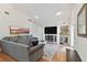 Spacious living room with comfortable seating, custom built-ins, and ample natural light at 3006 W Angeles St, Tampa, FL 33629