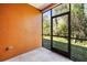 Screened patio with lush greenery, great for outdoor relaxation and enjoying the natural surroundings at 30103 Mossbank Dr, Wesley Chapel, FL 33543