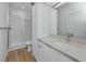 Bright bathroom with granite counters, modern shower, and all-white fixtures at 3402 E 28Th Ave # 4, Tampa, FL 33605