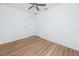 Spacious bedroom with wood-look floors and ample closet space at 3402 E 28Th Ave # 4, Tampa, FL 33605
