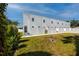 New townhome with a modern design, white walls, and a manicured lawn at 3402 E 28Th Ave # 4, Tampa, FL 33605