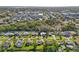 This aerial view features homes in a well-manicured neighborhood with mature trees at 4065 38Th S St, St Petersburg, FL 33711