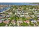 Overhead real estate shot of homes in a scenic area with lawns and mature trees at 4065 38Th S St, St Petersburg, FL 33711