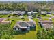 Well-maintained home featuring a lush lawn and a long driveway on a sunny day at 4065 38Th S St, St Petersburg, FL 33711