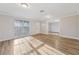 Open living area featuring gorgeous flooring, neutral walls, and abundant natural light at 4065 38Th S St, St Petersburg, FL 33711