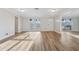 Bright and airy living space with beautiful flooring and large windows at 4065 38Th S St, St Petersburg, FL 33711