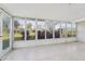Enclosed patio with tiled floor and ample natural light at 4065 38Th S St, St Petersburg, FL 33711