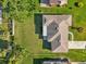 Overhead view of the house with a well-maintained roof and large, grassy yard at 4065 38Th S St, St Petersburg, FL 33711