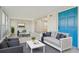 Bright sunroom features a seating area, dining set, and large glass sliding door at 4065 38Th S St, St Petersburg, FL 33711