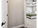 View into a bedroom featuring a modern tray ceiling and decorative bed and bedding set at 4307 Dristol Ave, Spring Hill, FL 34609