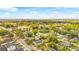 This aerial view showcases a neighborhood with mature trees and a mix of residential homes at 4803 N 9Th St, Tampa, FL 33603