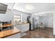 Bright kitchen boasts butcher block countertops and stainless steel appliances, complemented by a cozy dining area at 4803 N 9Th St, Tampa, FL 33603