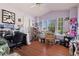 Bright home office/bedroom with hardwood floors and natural light at 5167 Sterling Manor Dr, Tampa, FL 33647
