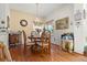 Formal dining room with hardwood floors, chandelier and traditional decor at 5167 Sterling Manor Dr, Tampa, FL 33647