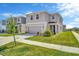 Charming two-story home with well-maintained landscaping and a two-car garage at 5758 Hollingworth Trl, Wesley Chapel, FL 33545