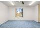 Bright bedroom features a large window that looks out to a picturesque lake view at 770 Arthurs Ct, Tarpon Springs, FL 34689