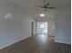 Bright and airy dining room featuring a modern ceiling fan, and wood laminate flooring at 807 Nectar Rd, Venice, FL 34293