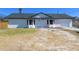 Charming single-story home featuring a new roof, fresh paint, and an attached garage at 807 Nectar Rd, Venice, FL 34293