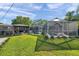 Expansive backyard with gazebo, pool, and lush lawn for outdoor enjoyment at 865 48Th N Ave, St Petersburg, FL 33703