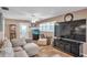 Cozy living room featuring a comfortable sectional sofa, large TV, and a decorative fish tank, creating a relaxing atmosphere at 865 48Th N Ave, St Petersburg, FL 33703