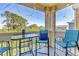 Relaxing screened-in balcony with outdoor seating, perfect for enjoying the view at 115 112Th Ne Ave # 310, St Petersburg, FL 33716