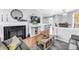 Cozy living room featuring a fireplace, modern decor, and hardwood floors at 115 112Th Ne Ave # 310, St Petersburg, FL 33716