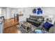 Comfortable living room with modern decor, hardwood floors, and bright natural light at 115 112Th Ne Ave # 310, St Petersburg, FL 33716