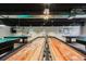Fully equipped game room with shuffleboard, ping pong, and billiards for leisure activities at 11521 Rose Tree Dr, New Port Richey, FL 34654