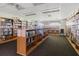 Serene library filled with rows of bookshelves, offering a quiet space for reading and study at 11521 Rose Tree Dr, New Port Richey, FL 34654