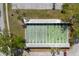 Aerial view of the community shuffleboard courts, providing a fun recreational amenity for residents and their guests at 11521 Rose Tree Dr, New Port Richey, FL 34654