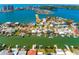 High aerial view showcasing a waterfront home with canals and boating access in a coastal community at 118 Wall St, Redington Shores, FL 33708