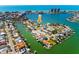 Panoramic aerial view of waterfront homes on canals with docks, showcasing boating access to the ocean at 118 Wall St, Redington Shores, FL 33708