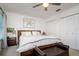 Bright bedroom with a king bed, closet, and neutral tones creating a relaxing atmosphere at 118 Wall St, Redington Shores, FL 33708