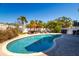 Refreshing pool area with manicured landscaping offering a private, relaxing outdoor space at 118 Wall St, Redington Shores, FL 33708