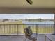 Unwind on the balcony, offering peaceful water views and outdoor seating at 12808 Boggy Creek Dr, Riverview, FL 33579