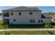 Classic home features a manicured lawn, neutral color scheme and ample natural light at 12808 Boggy Creek Dr, Riverview, FL 33579