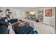 Spacious living area with plush carpeting, stylish furnishings, and a comfortable layout for entertaining at 12808 Boggy Creek Dr, Riverview, FL 33579