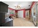 Multi-purpose room featuring tiled floors and doors leading to a beautiful pool area at 1542 Picardy Cir, Clearwater, FL 33755